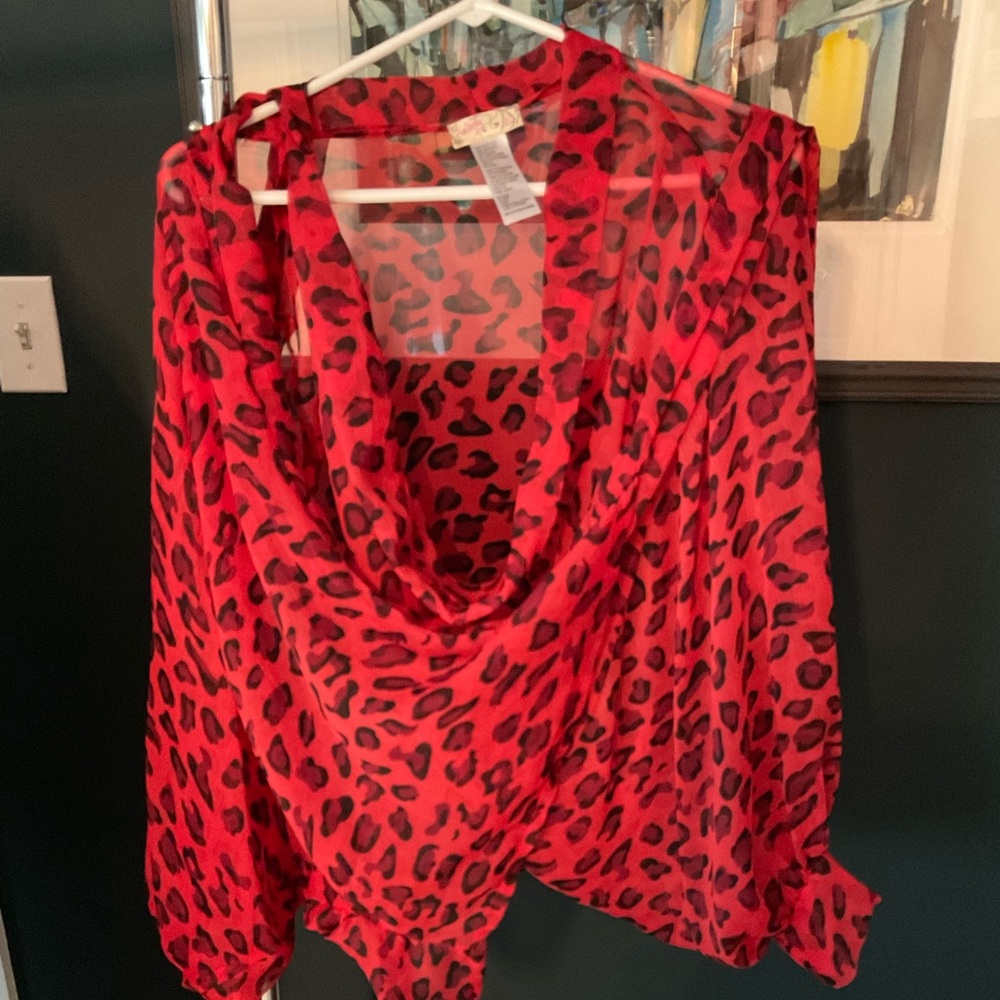 Shear leopard wrap top